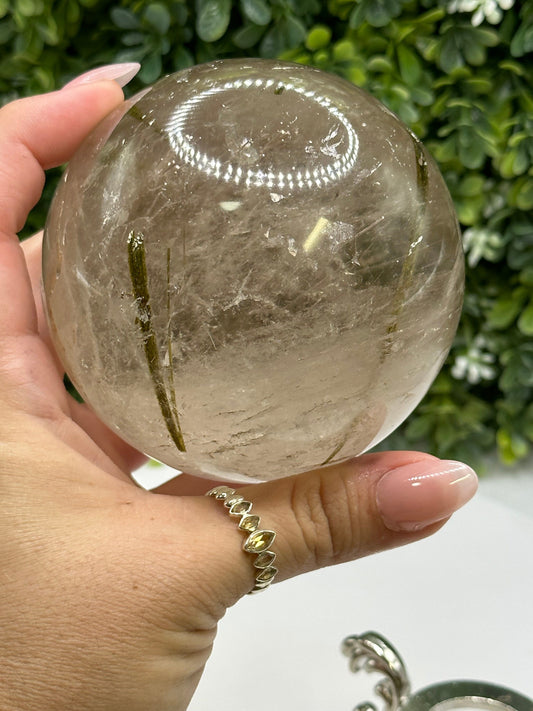 Green Tourmaline needles in smoky Quartz sphere Mina Gerais Brazil